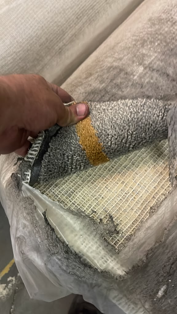 Close-up of new carpet backing and pile