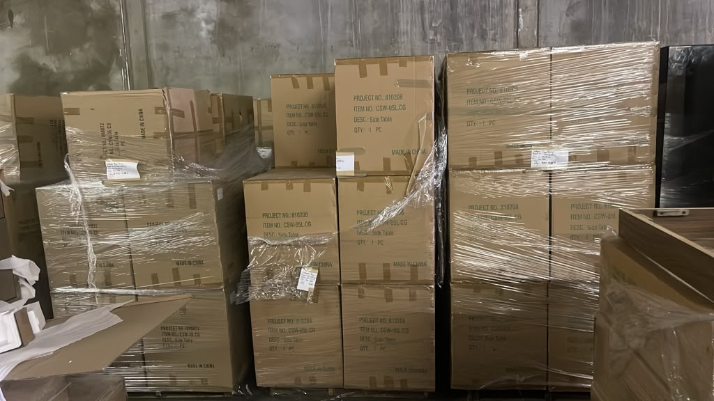 Pallets of boxed brand-new side tables