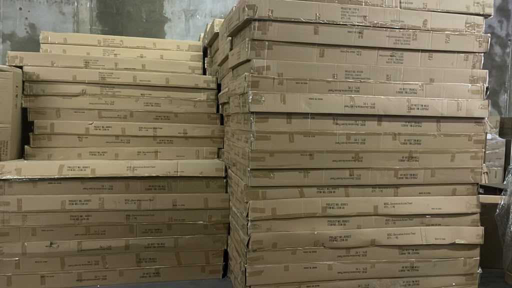Stacks of boxed brand-new decorative accent panels