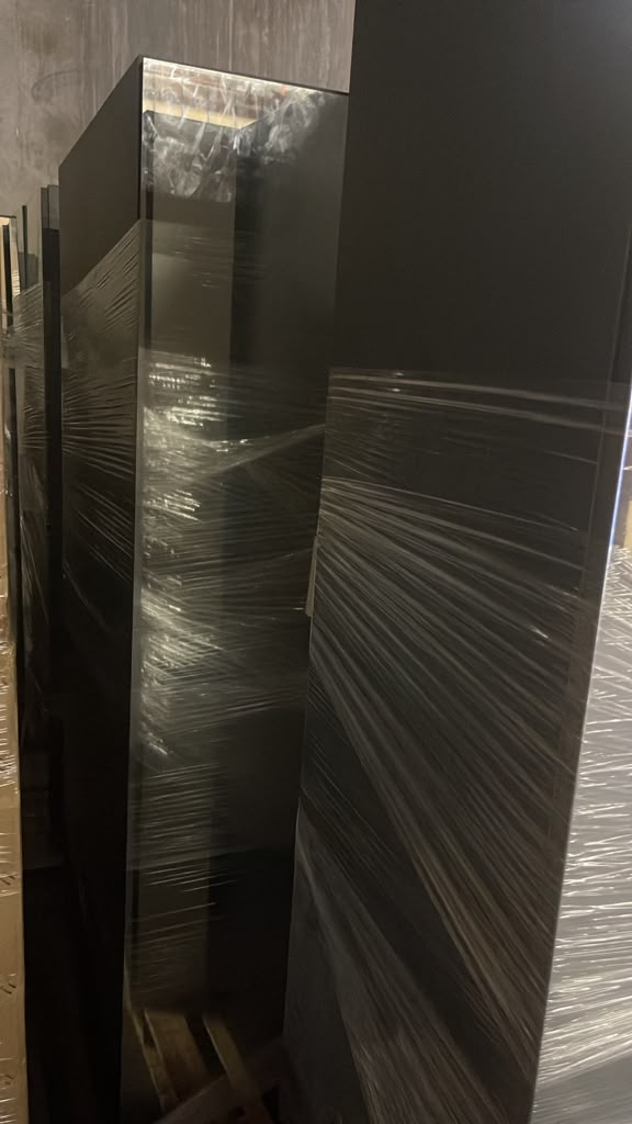 Additional brand-new mirrored wardrobe units in storage