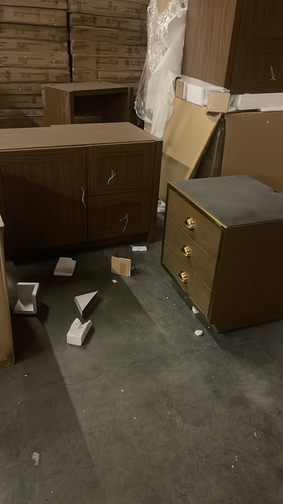 Brand-new dressers, nightstands and case goods staged in the warehouse